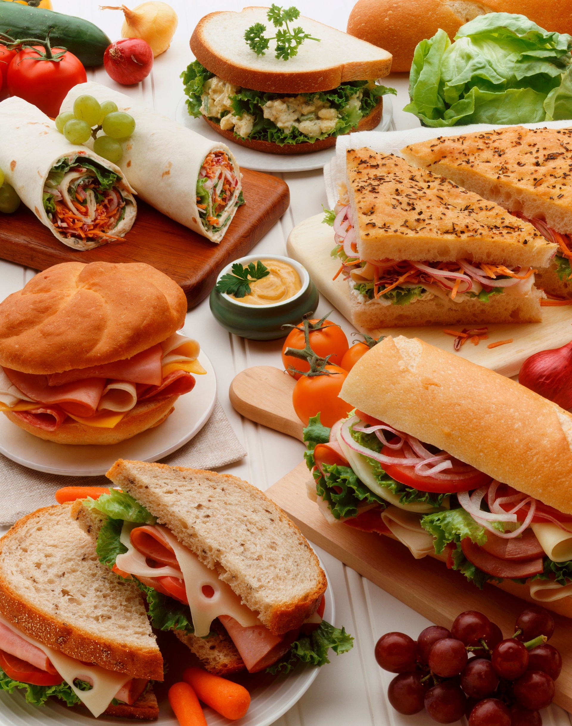 Spread of different types of meticulously styled sandwiches